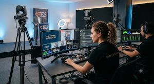 Professional live streaming production crew operating multi-camera broadcast switcher for a corporate conference in Limassol, Cyprus by Eventechpro.